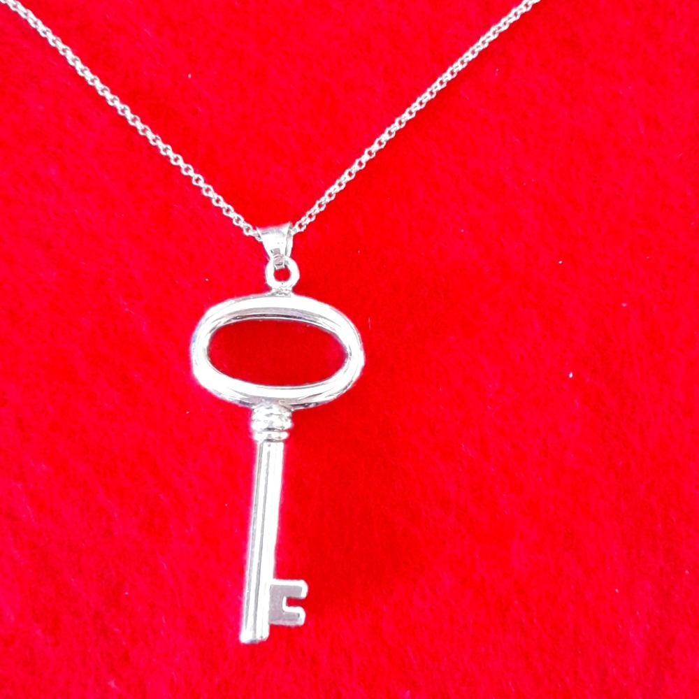 Charles Garnier Key Necklace.